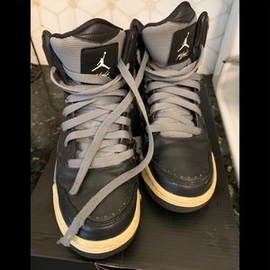 Kids Jordan high top sneakers.